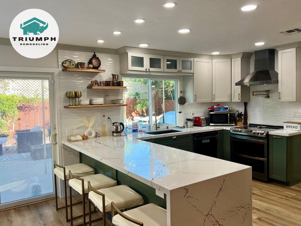 Full Kitchen Remodel: - New semi custom cabinets olive green color - New Cambria quartz countertops - New LED recessed lights - Matching cabinets small work area - Refinished fireplace with Matching slabs - New LVP flooring San Diego, CA 92129